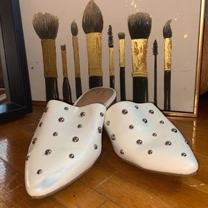 Open back, spiky white shoes. (Worn only once)